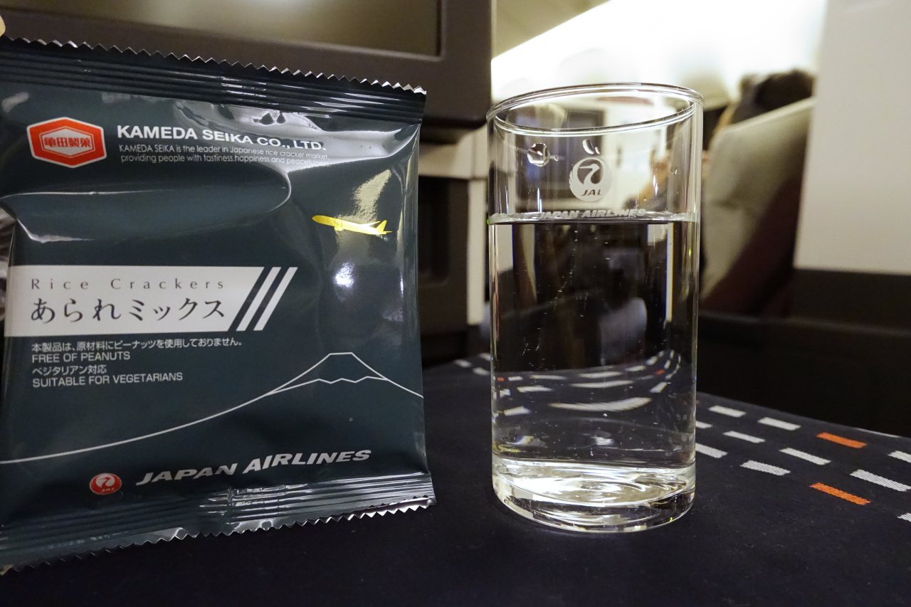 JAL Business Class Review-Arare Rice Crackers and Drink