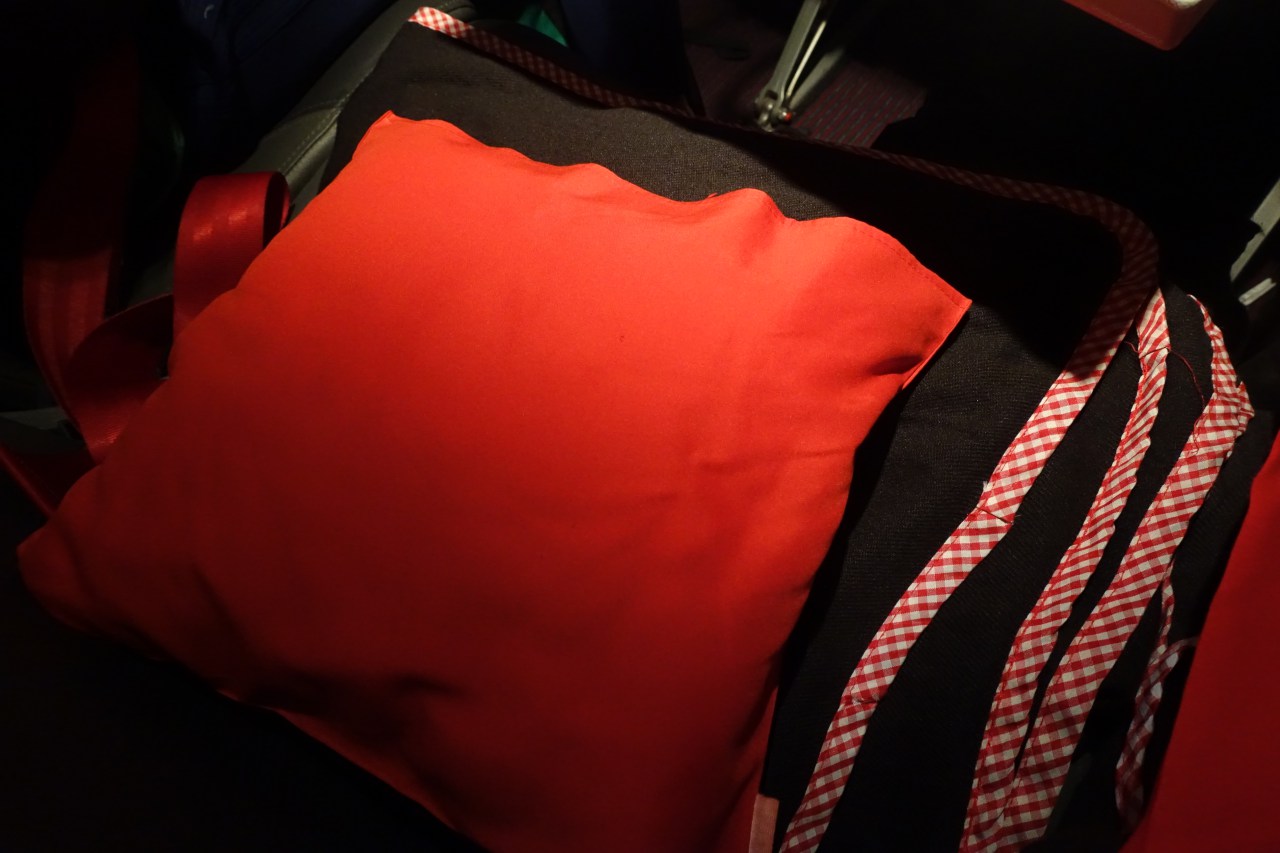 Austrian Airlines A320 Business Class Review: Red Pillow and Grey Blanket