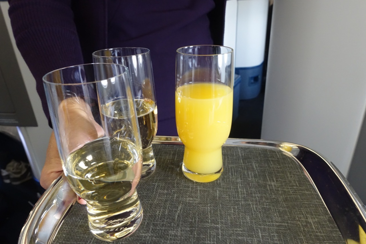 Delta One Review: Welcome Champagne and Orange Juice
